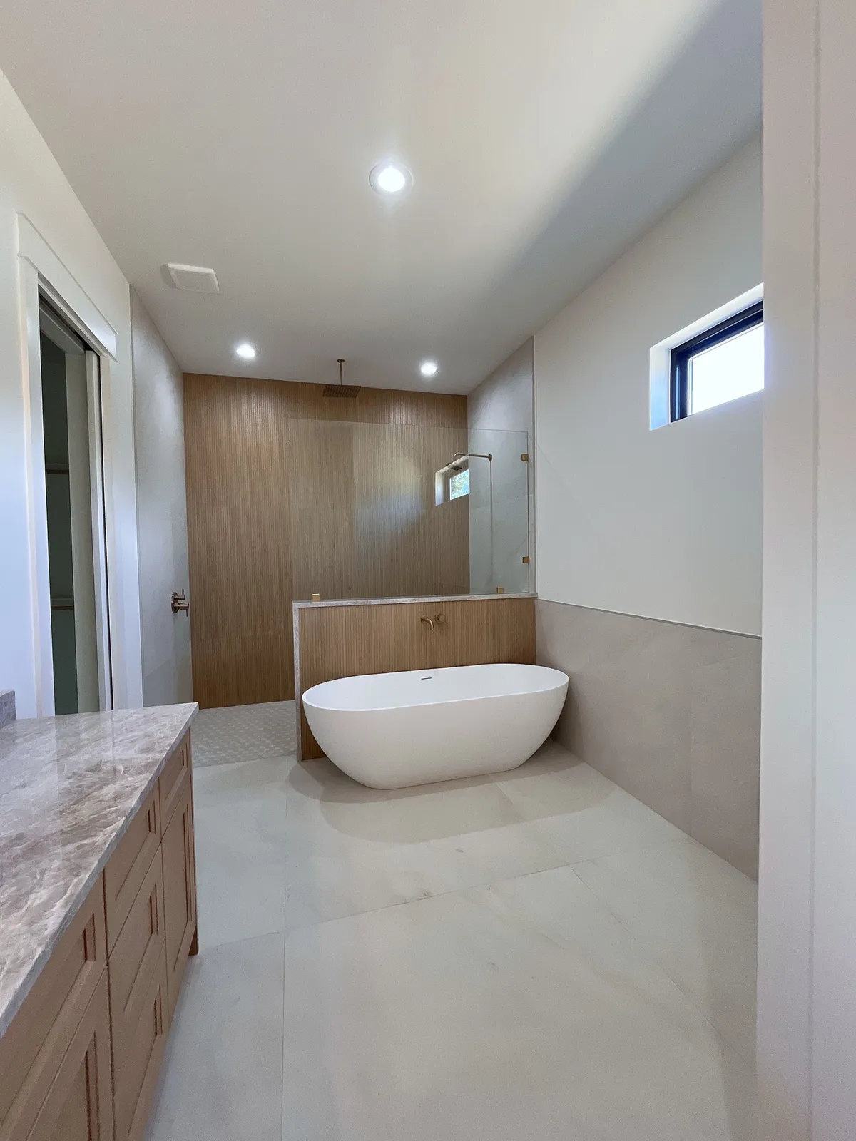Spa primary bath with a freestanding tub
